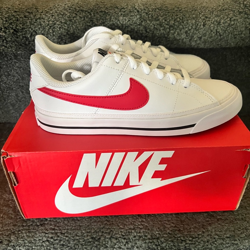 White Nike with Red Nike check.